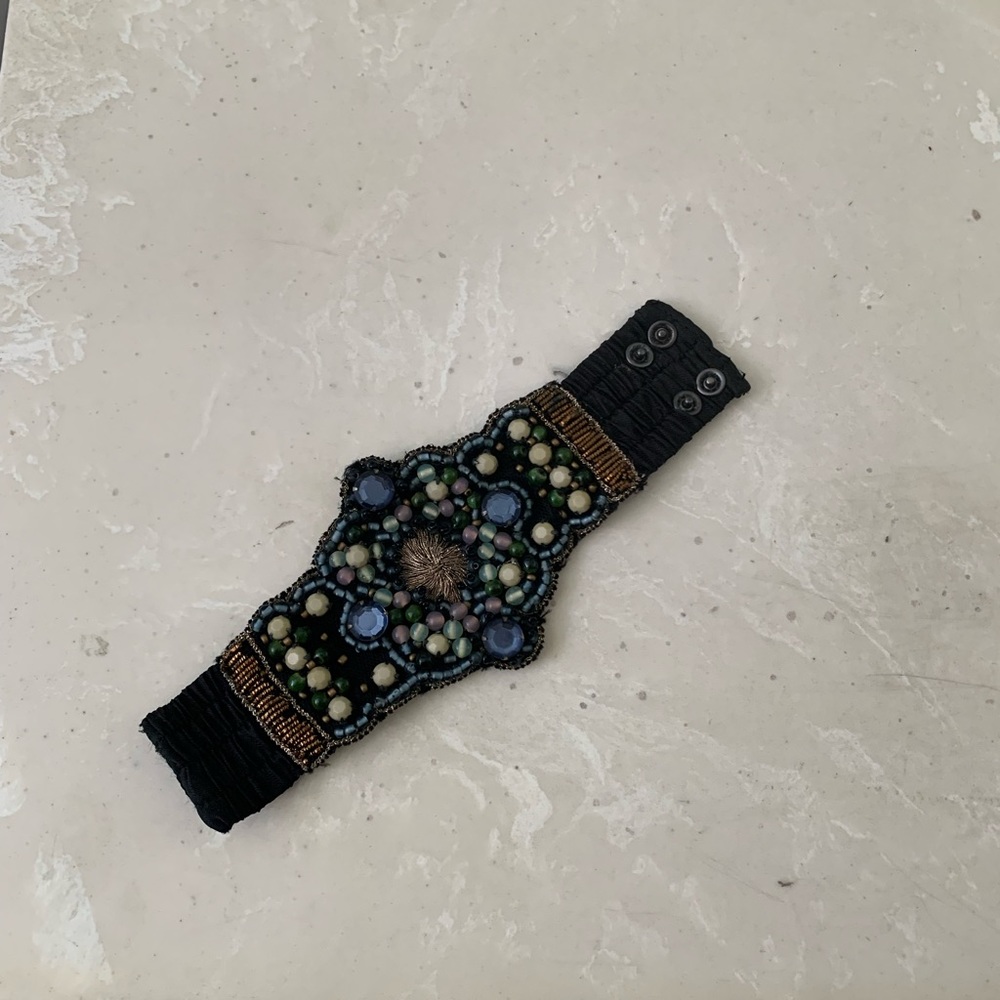 Blue, black and gold stretch bracelet. Excellent condition.